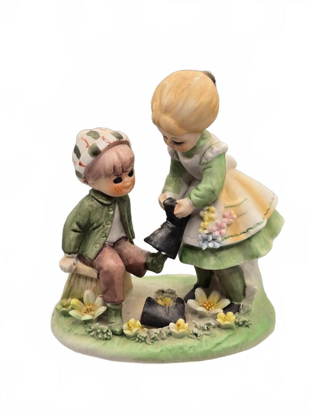 Green Irish theme, Figurine of girl helping seated boy, Lefton?, Josef? Homco?